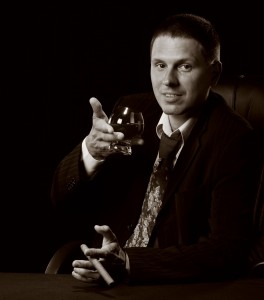 1558300-the-man-with-a-cigar-and-a-glass-of-cognac